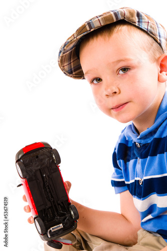 Photo: Boy and toy car Boy and toy car