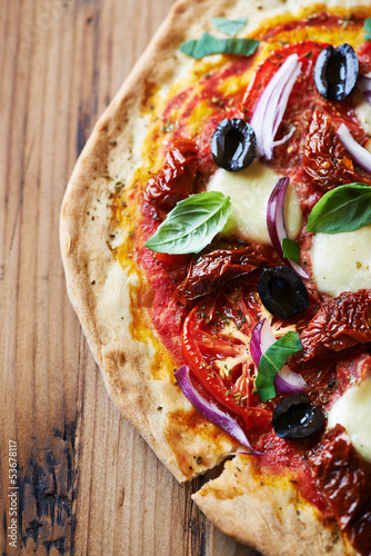 Photo: Pizza with fresh and dried tomatoes Pizza with fresh and dried tomatoes
