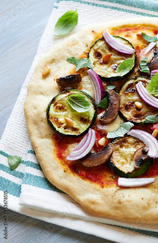 Photo: Pizza with grilled courgette, mushrooms and pine nuts Pizza with grilled courgette, mushrooms and pine nuts