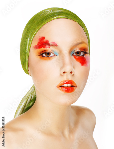 Photo: Fantasy. Glamor. Woman in Green Shawl and Colorful Makeup Fantasy. Glamor. Woman in Green Shawl and Colorful Makeup