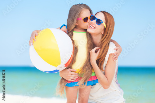 Photo: Two girls at outdoor near sea. Two girls at outdoor near sea.