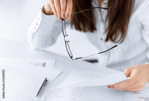 Photo: woman hands with blank paper woman hands with blank paper
