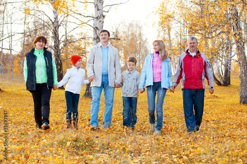 Photo: Family in autumn park Family in autumn park