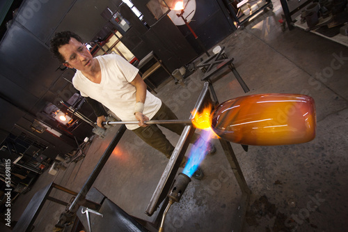 Photo: Glass Worker with Vase and Blowtorch Glass Worker with Vase and Blowtorch