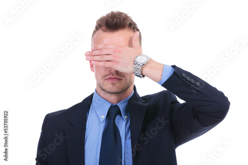 Photo: business man sees no evil business man sees no evil