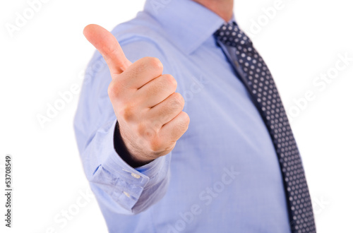 Photo: Business man showing thumbs up sign. Business man showing thumbs up sign.