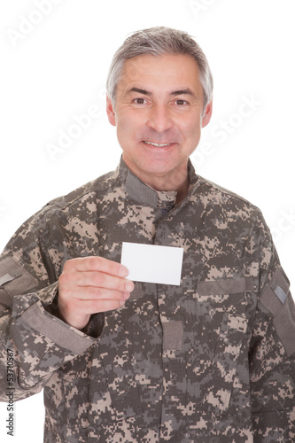 Photo: Mature Soldier Holding Blank Paper Mature Soldier Holding Blank Paper