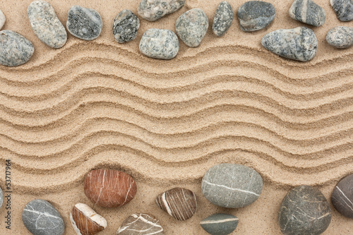 Photo: Stone with sand as background Stone with sand as background