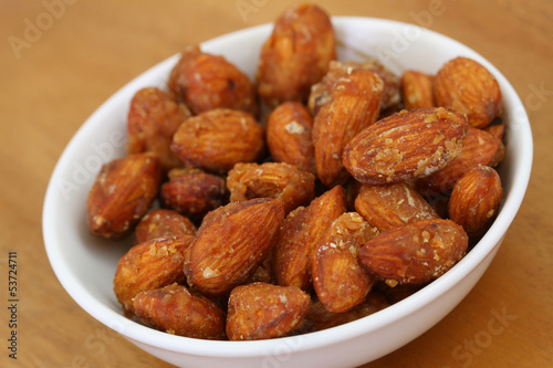 Photo: Caramelized almonds, close up Caramelized almonds, close up