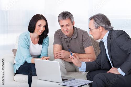 Photo: Couple Meeting Consultant Couple Meeting Consultant