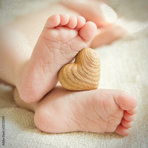 Photo: small delicate little feet to keep the wooden heart small delicate little feet to keep the wooden heart