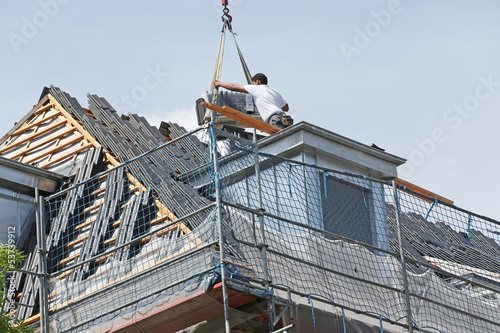 Photo: Dachdecker auf Gaube Dachdecker auf Gaube