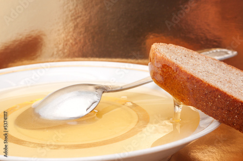 Photo: The still life with the natural honey and slice of bread The still life with the natural honey and slice of bread