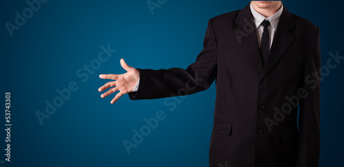 Photo: Businessman pressing imaginary button Businessman pressing imaginary button