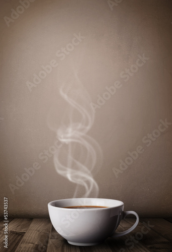 Photo: Coffee cup with abstract white steam Coffee cup with abstract white steam