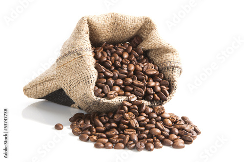 Photo: coffee beans in brown bag. coffee beans in brown bag.