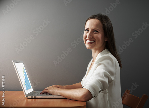 Photo: woman working with laptop woman working with laptop