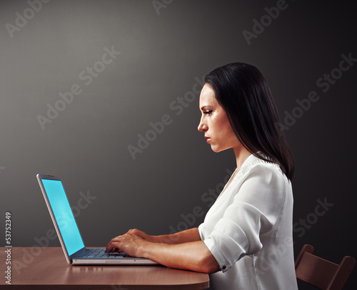 Photo: woman working with laptop woman working with laptop