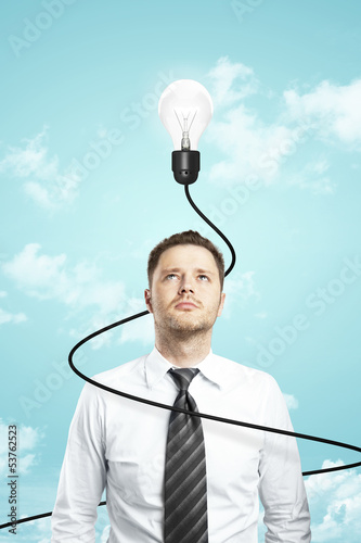 Photo: businessman and lamp businessman and lamp