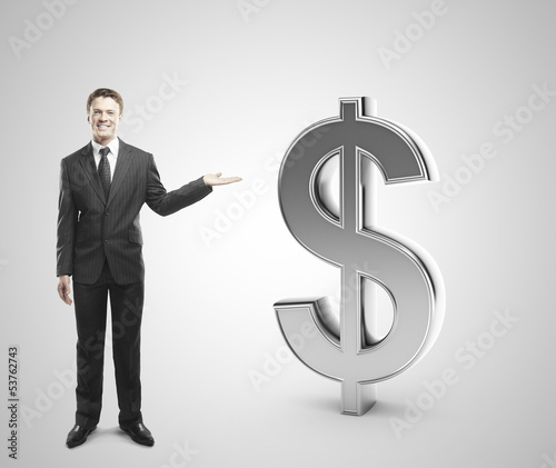 Photo: man showing dollar man showing dollar