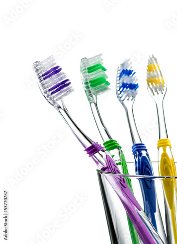 Photo: toothbrushes in a glass toothbrushes in a glass