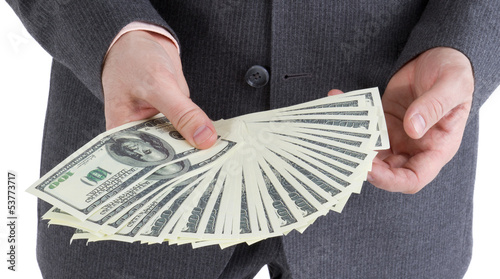 Photo: stack banknotes of 100 dollars in male hands stack banknotes of 100 dollars in male hands