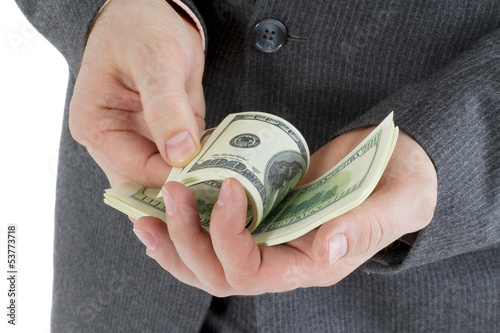 Photo: stack banknotes of 100 dollars in male hands stack banknotes of 100 dollars in male hands