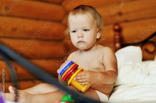 Photo: toddler with toy toddler with toy