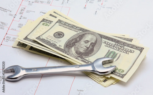 Photo: Spanner and dollars Spanner and dollars