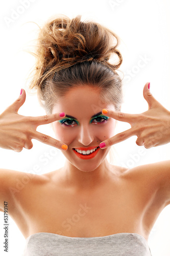 Photo: Beautiful woman with artistic makeup Beautiful woman with artistic makeup
