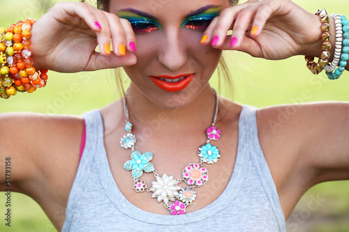Photo: Beautiful woman with artistic makeup Beautiful woman with artistic makeup