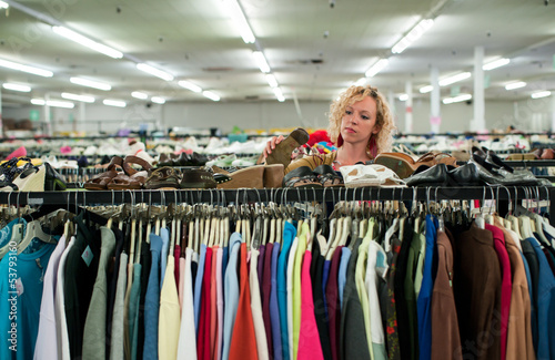 Photo: shoe browsing in a thrift store shoe browsing in a thrift store