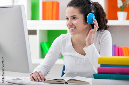 Photo: homework with headphones homework with headphones