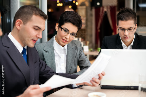 Photo: business team planning work business team planning work