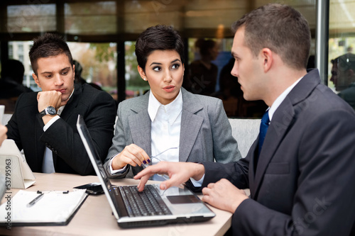 Photo: Business people having discussion Business people having discussion