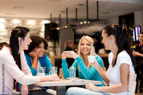 Photo: group of young women on coffee break group of young women on coffee break