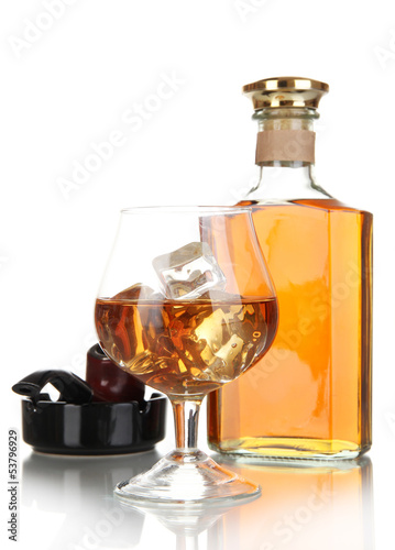 Photo: Brandy with ice and cigar isolated on white Brandy with ice and cigar isolated on white