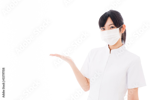 Photo: attractive asian nurse on white background attractive asian nurse on white background