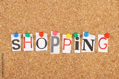 Photo: The word Shopping on a cork board The word Shopping on a cork board