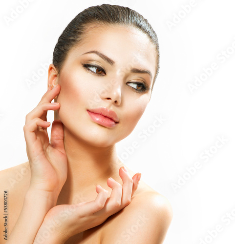 Photo: Beautiful Young Woman Touching Her Face Beautiful Young Woman Touching Her Face