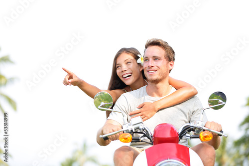 Photo: Scooter - couple lifestyle fun driving in summer Scooter - couple lifestyle fun driving in summer