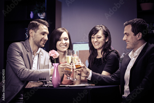 Photo: friends in a restaurant friends in a restaurant