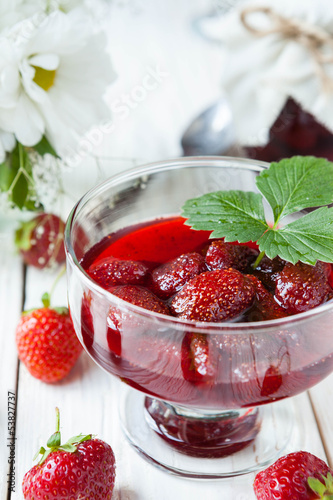 Photo: sweet strawberry jam in a bowl sweet strawberry jam in a bowl