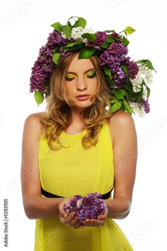 Photo: Beautiful girl in yellow dress wearing chaplet Beautiful girl in yellow dress wearing chaplet