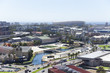 Photo: Elevated view of buildings in a city with Green Point Soccer Stadium in the background, Cape Town, South Africa Elevated view of buildings in a city with Green Point Soccer Stadium in the background, Cape Town, South Africa
