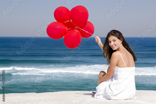 Photo: Girl with red ballons Girl with red ballons