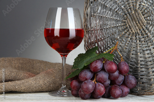 Photo: Ripe delicious grapes with glass of wine Ripe delicious grapes with glass of wine