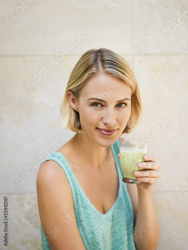 Photo: Woman drinking juice Woman drinking juice