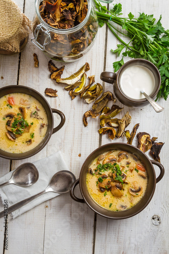 Photo: Two plate of mushroom soup and fresh ingredients Two plate of mushroom soup and fresh ingredients