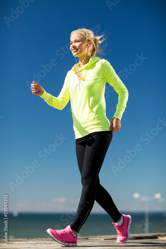 Photo: woman doing sports outdoors woman doing sports outdoors